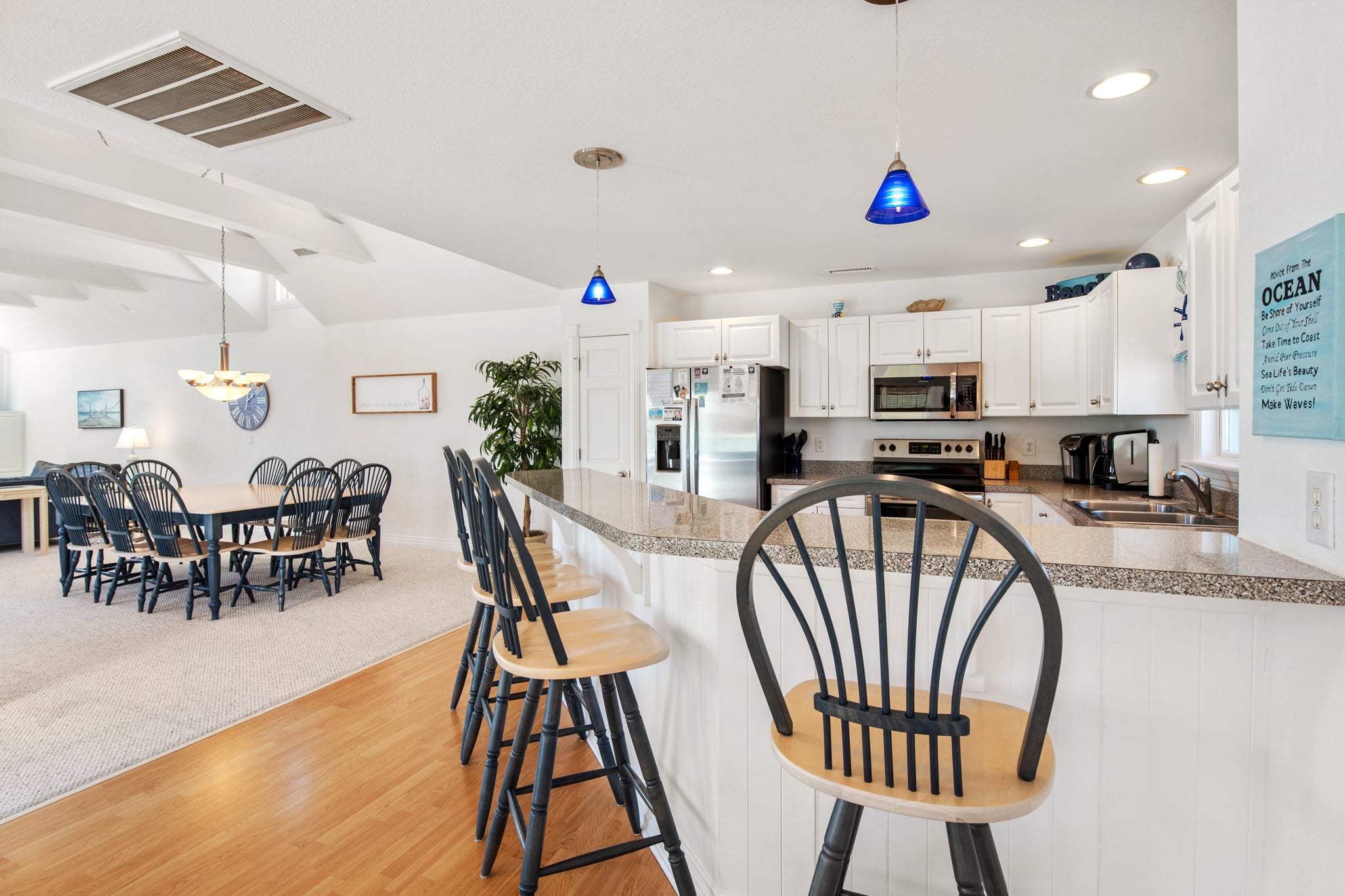 BU79: Caroline's Cove | Top Level Dining Area and Kitchen