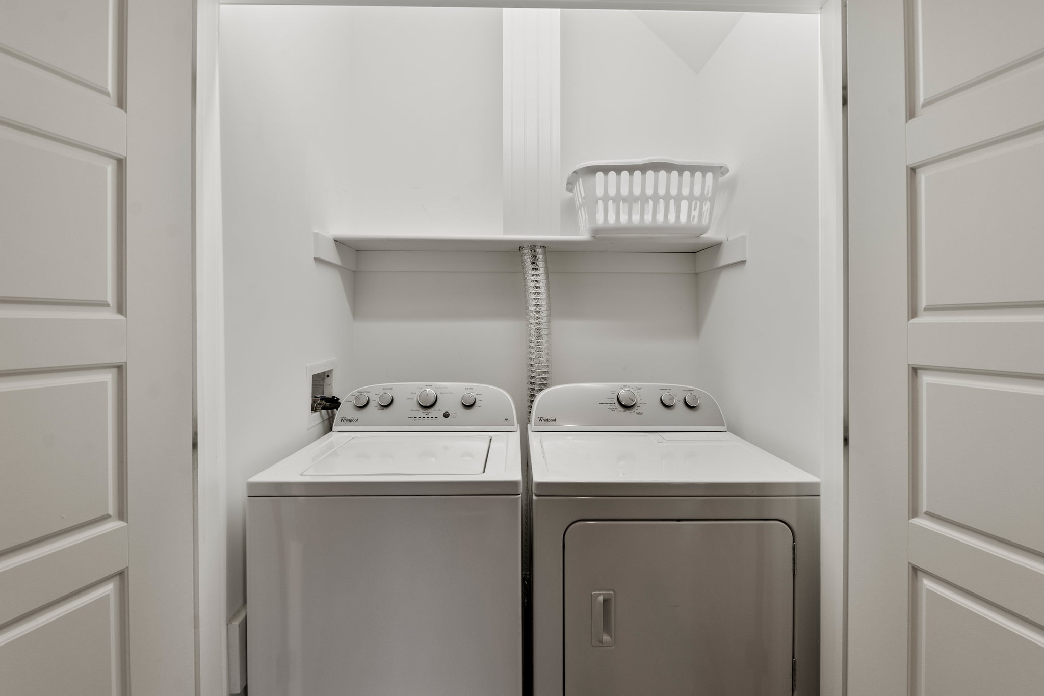 BV1084A: It's About Time | Bottom Level Laundry Area