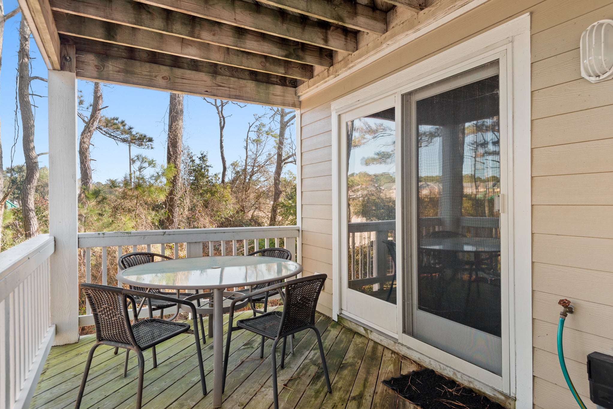 CL572: Endless Sunsets in Corolla Light l Mid Level Covered Deck