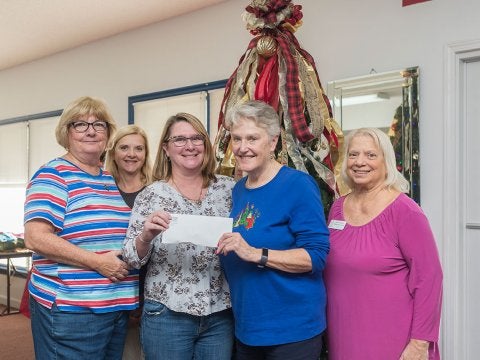 Village Realty Raises $13k+ for Woman’s Club Angel